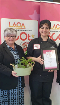 Dee Karakus being awarded with her School Cook of the Year Award